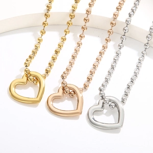 Three-color hollow heart pendant necklaces in gold, rose gold, and silver stainless steel
