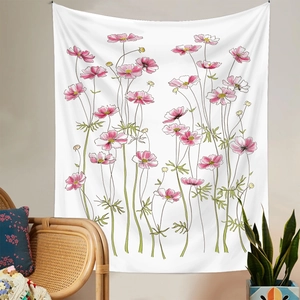 Detail of floral tapestry hanging on wall featuring pink cosmos illustration for home decor