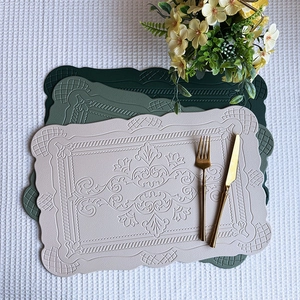 Nordic embossed faux leather placemats in beige, sage green and dark forest green