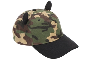 Detail shot of camo baseball cap featuring unique black horns and cotton fabric texture