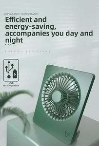 Detail of forest green desktop fan with square grille and USB charging efficiency icon