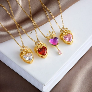 Pink and purple crystal heart necklaces with golden crown detail for women