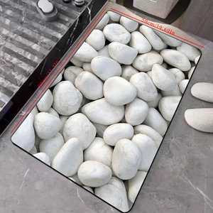 Detail view of 3D pebble pattern bath mat showing 80x50cm dimensions and quick-dry texture