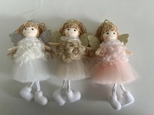 Detailed view of handmade angel ornaments with glitter wings and soft tulle skirts
