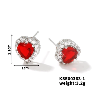 Detailed close-up showing red heart stud earrings dimensions 1cm x 1.1cm and 3.2g weight