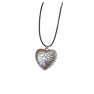 Vintage silver heart necklace with embossed patterns and adjustable black wax cord