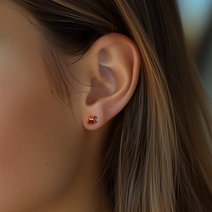 Close-up of bohemian S925 silver stud earrings with colorful square zircons on model