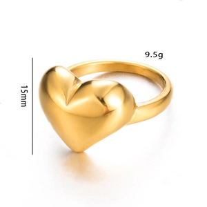 Detailed view of golden heart ring showing 15mm height and 9.5g weight specifications