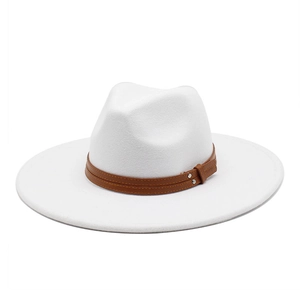 Close-up of white wool fedora hat with brown leather band and silver metal rivets