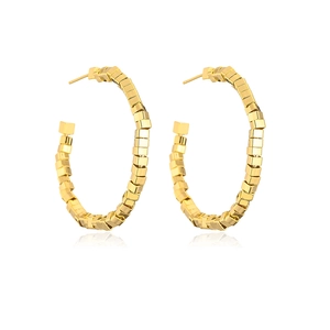 Macro detail of gold-plated geometric square link hoop earrings with shiny metal finish