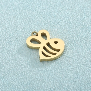 Minimalist golden hollow honey bee pendant in stainless steel with a top hanging loop