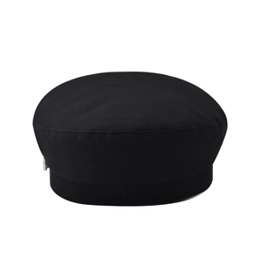 Detailed view of black baker boy hat featuring premium twill fabric and reinforced crown