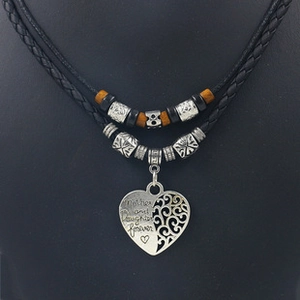 Detail of silver heart pendant with Mother and Daughter forever engraving and beads