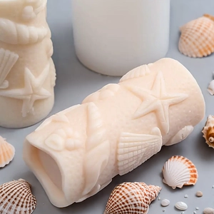 Ocean themed cylindrical silicone mold featuring starfish and shell relief for DIY candles