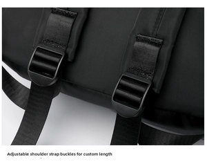 Detail of adjustable black nylon shoulder straps with durable plastic buckles for backpacks