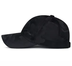 Detail of breathable black camo mesh fabric with silver metal logo on baseball cap