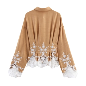 Elegant brown long-sleeve blouse with white lace patchwork and floral embroidery on back