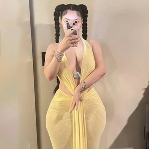 Sexy yellow two-piece set featuring a halter V-neck mesh top and bodycon skirt