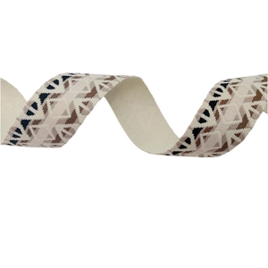 Ethnic style geometric woven bag strap with thick blue and brown patterns on beige