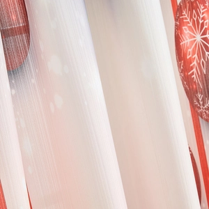 Detail of semi-transparent mesh fabric with red snowflake and Christmas ball prints