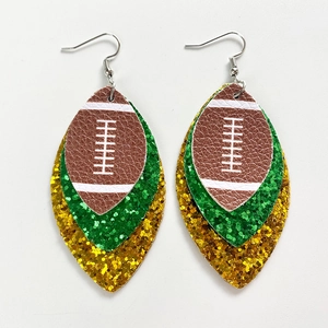 Detail of multi-layer American football faux leather earrings with green and gold glitter