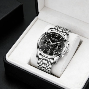 Detailed view of an elegant men's stainless steel watch in a premium gift box