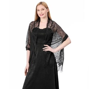 Close-up of black floral lace shawl featuring delicate embroidery and long tassel fringe