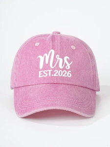Detailed close-up of white Mrs EST.2026 lettering on a pink washed cotton baseball cap