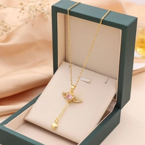 Gold angel wing necklace with pink heart gemstone and tassel pendant for women
