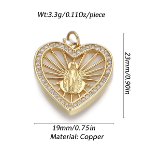Golden heart pendant with Virgin Mary relief and clear crystals on white background