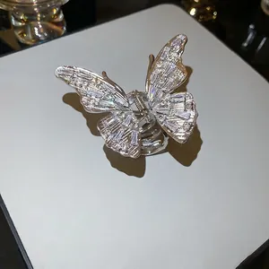 Silver butterfly hair claw clip with shiny cubic zirconia stones for elegant women
