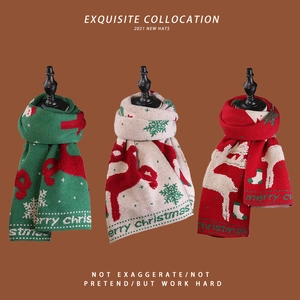Three Christmas knitted scarves in red, white and green with reindeer and tree patterns