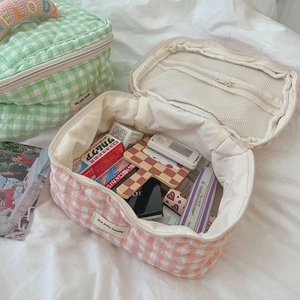 Quilted cotton plaid makeup bag in pink and green with spacious interior and zipper