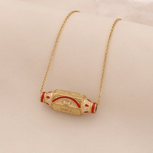 Collana dorata con ciondolo a cilindro malocchio in smalto rosso e bianco su catena fine