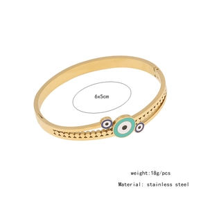 Detailed specs of gold stainless steel evil eye bangle measuring 6x5cm and weighing 18g