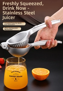 Macro view of zinc alloy manual juicer squeezing orange juice with threaded pressure grooves