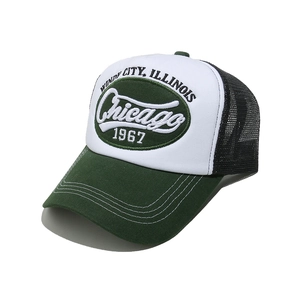 Detail of Chicago 1967 embroidery and mesh back on retro trucker hat in green and white