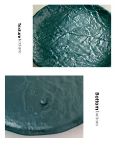 Detail view showing textured surface and round support base of the dark green metal tray