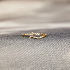 Elegant gold double wave s925 silver ring featuring sparkling white cubic zirconia stones
