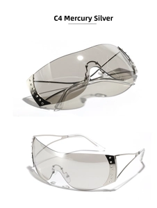 Detail view of Y2K rimless oversized sunglasses with silver rivets and mirror lenses