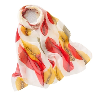 Elegant long breathable silk scarf with red and yellow leaf patterns on cream chiffon