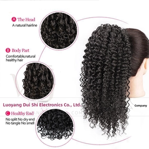 Close-up of black kinky curly synthetic ponytail extension showing texture and elasticity