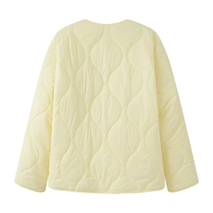 Back view of light yellow long sleeve quilted jacket with unique wavy stitching pattern