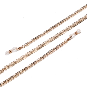 Golden handmade glasses chain featuring intricate leaf shape metal links and rubber loops