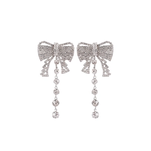 Elegant silver bow earrings featuring shimmering rhinestones and long fringe tassels