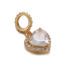 Close-up of golden heart charm with clear zircon stones for stylish bracelets
