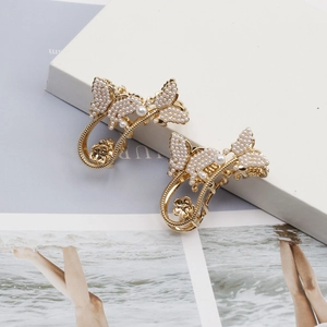 Elegante goldene Schmetterling-Haarklammern mit weißen Perlen und Strasssteinen für Damen