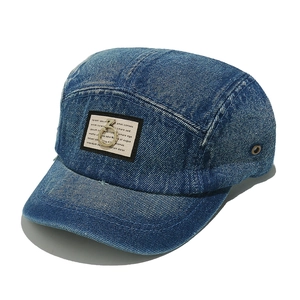 Washed blue denim 5-panel baseball cap with vintage distressed finish and patch detail