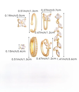 Detail showing precise dimensions of butterfly and floral ear piercing set components