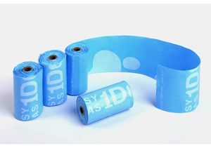 Detail showing the flexible light blue biodegradable dog waste bags with easy tear design
